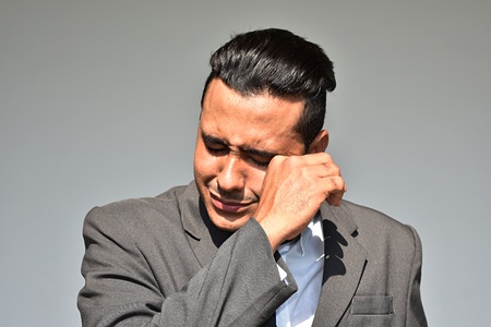 Crying Hispanic Business Manの写真素材