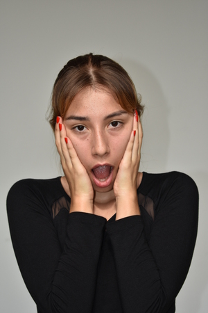 Shocked Latina Teen Femaleの写真素材
