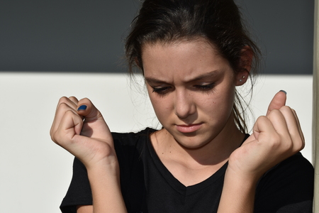 Youthful Girl And Worryの写真素材