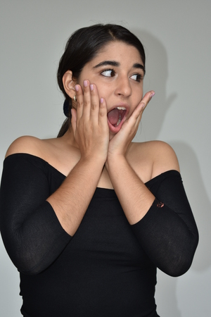 Surprised Youthful Colombian Girlの写真素材