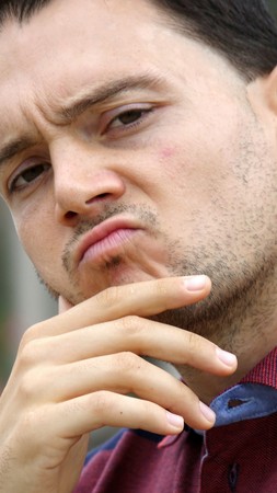 Unshaven Male And Confusion