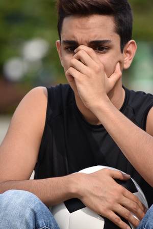 Shameful Young Soccer Playerの写真素材