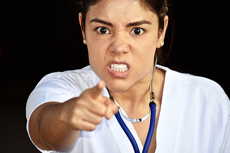 Beautiful Female Nurse And Angerの写真素材