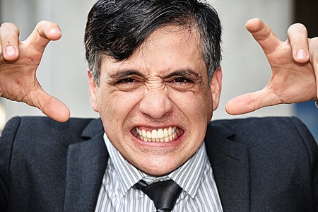 Stressed Business Executive Wearing Suit And Tieの写真素材