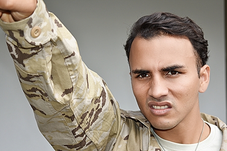 Pointing Latino Male Soldierの写真素材