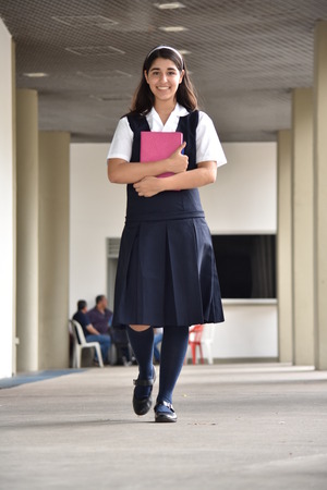 Walking Cute Colombian School Girl Student Teenagerの写真素材