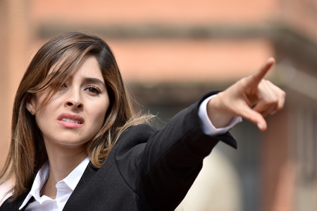Colombian Business Woman Pointingの写真素材