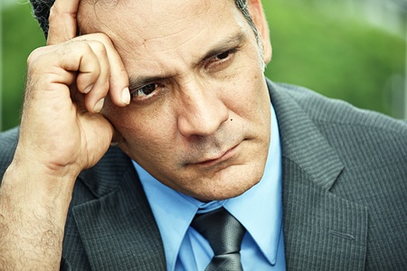 Worrisome Business Man Wearing Suit And Tieの写真素材