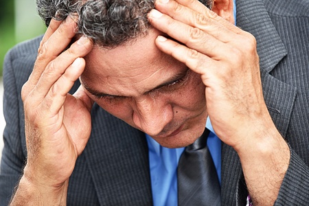 Stressful Business Man Wearing Suit And Tieの写真素材