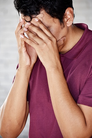 Unhappy Hispanic Male