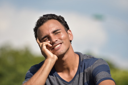 Wondering Hispanic Maleの写真素材