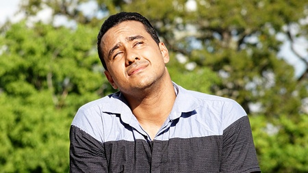 Adult Hispanic Male Wondering