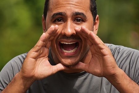 Adult Male Athlete Yellingの写真素材