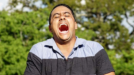 Laughing Adult Hispanic Maleの写真素材