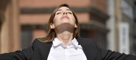 Adult Colombian Business Woman And Freedom Wearing Suitの写真素材