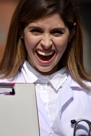 Female Medical Professional And Happiness Wearing Lab Coatの写真素材