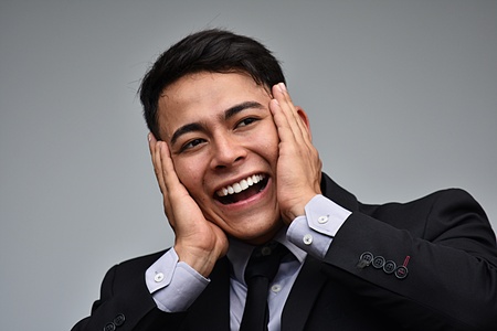 Surprised Business Man Wearing Business Suitの写真素材