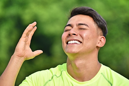 Minority Male Athlete Laughingの写真素材