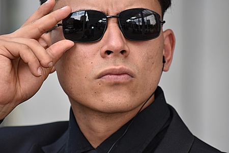 Serious Minority Agent Wearing Sunglassesの写真素材