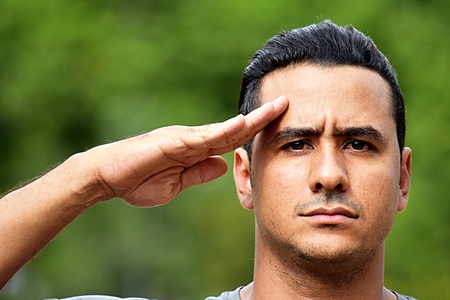 Saluting Civilian Adult Hispanic Maleの写真素材