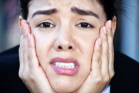Minority Business Woman Under Stress Wearing Suitの写真素材