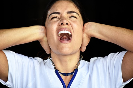 Mad Young Colombian Female Nurseの写真素材