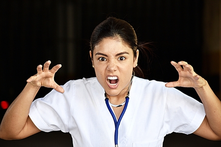 Female Nurse And Angerの写真素材