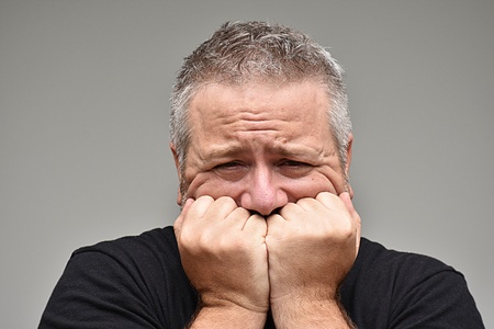 Fearful Overweight Man