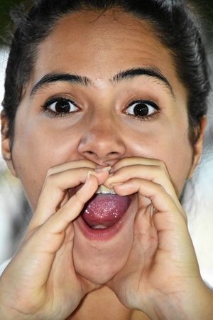 Cute Colombian Girl Shoutingの写真素材