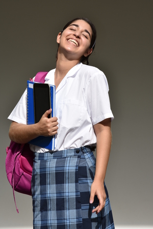 Happy Catholic Colombian School Girl Wearing School Uniformの写真素材