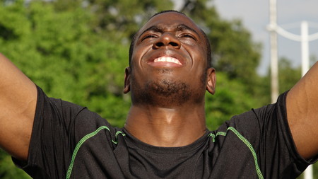 Athletic African Male Athlete And Winning