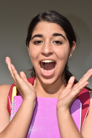 Surprised Hispanic Girl Studentの写真素材
