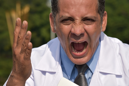 Mad Hispanic Male Doctorの写真素材