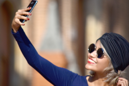 Diverse Muslim Female Selfie Wearing Turbanの写真素材
