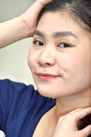 Portrait Of A Young Chinese Femaleの写真素材
