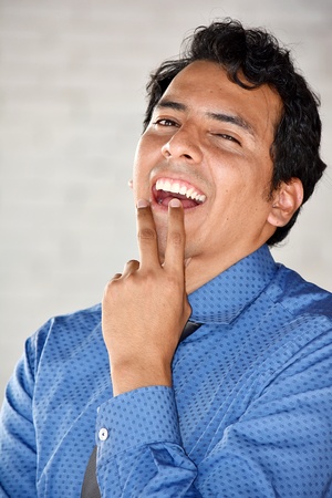 Young Colombian Businessman Wondering Wearing Tieの写真素材