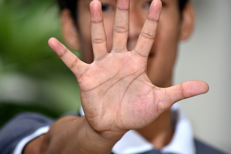 Diverse Male Gesturing Stopの写真素材