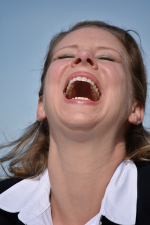 Business Woman And Laughter Wearing Suitの写真素材