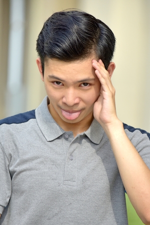 Male Making Funny Facesの写真素材