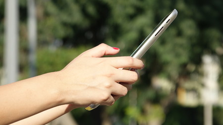 Female Hand Using Tabletの写真素材