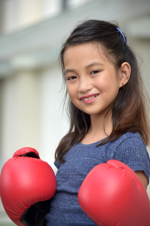 Athlete Asian Child Boxer Smilingの写真素材