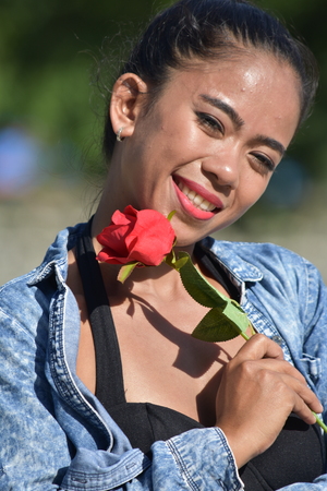 Female And Happiness With Rose Flowerの写真素材