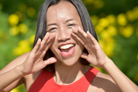 Asian Adult Female Talkingの写真素材