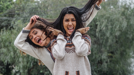 Goofy Teen Hispanic Girlsの写真素材
