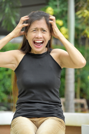 Stressful Filipina Grandmaの写真素材