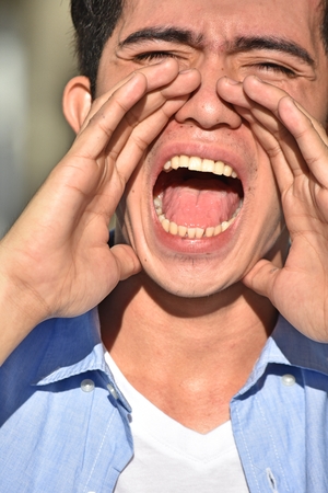 Young Filipino Male Shoutingの写真素材