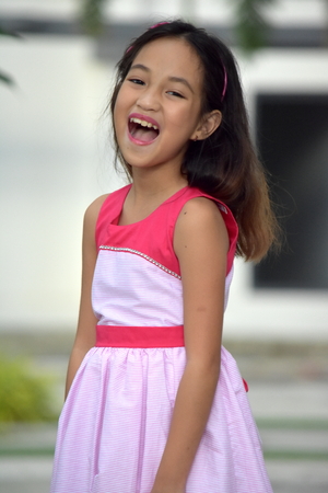 Youthful Filipina Female Laughingの写真素材
