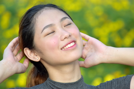 Beautiful Asian Woman Relaxingの写真素材