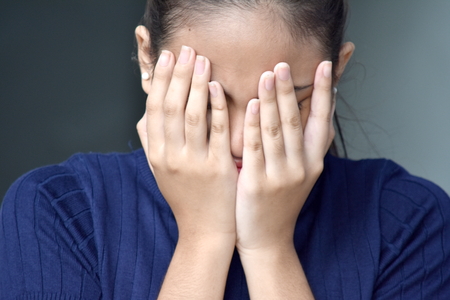 Ashamed Youthful Girlの写真素材