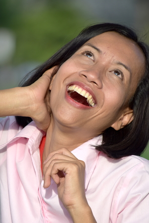 Beautiful Filipina Female Laughingの写真素材